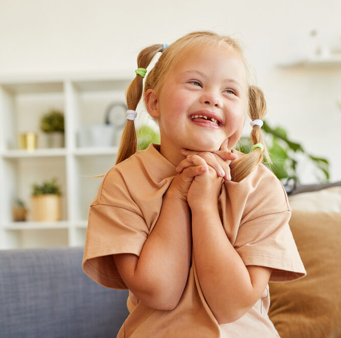 Young girl smiling after a positive dental visit.