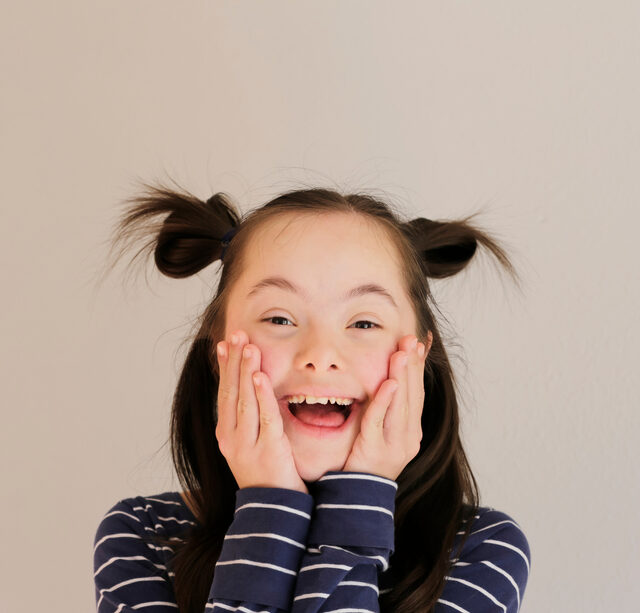 patient with special needs smiling